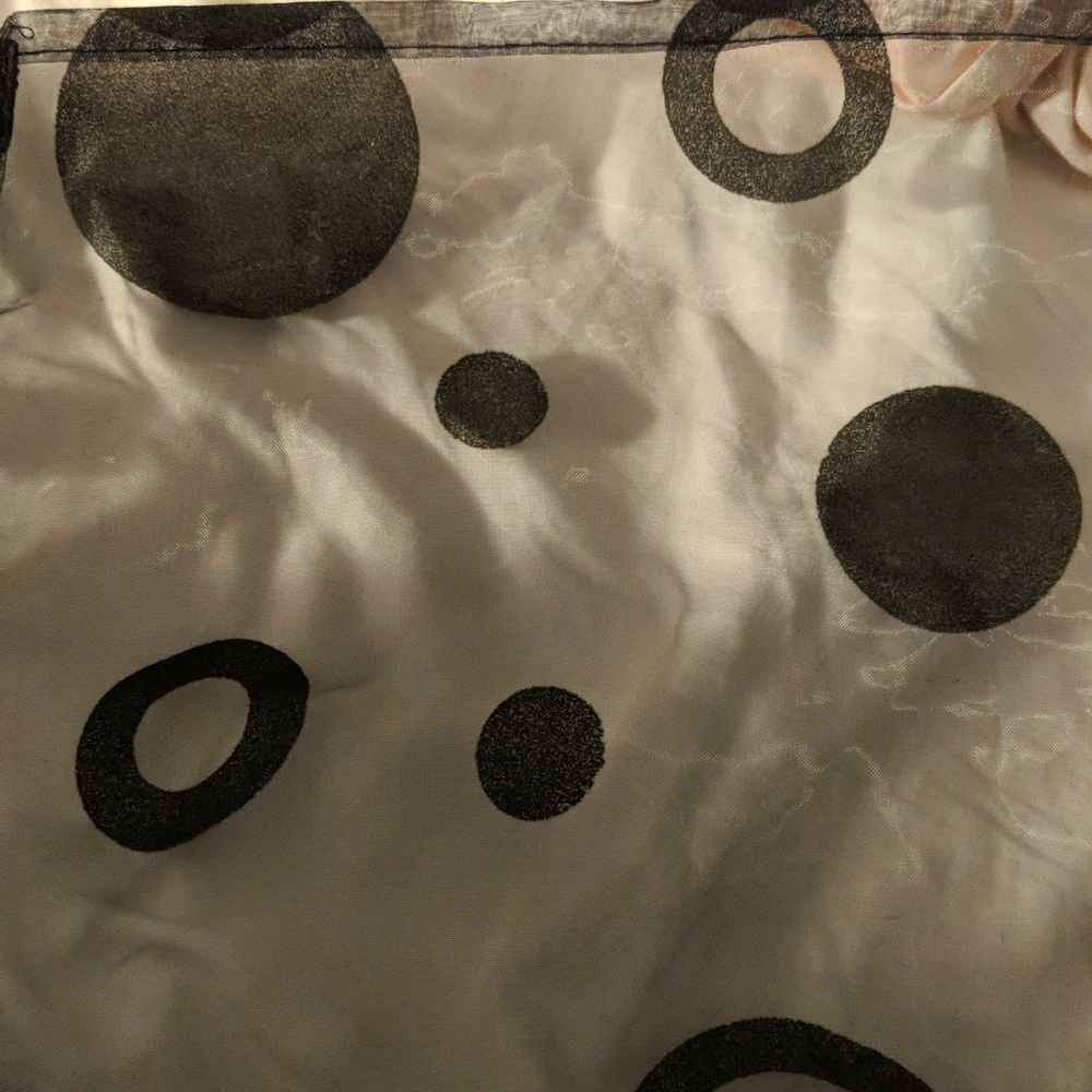 2- Black sheer curtain panels